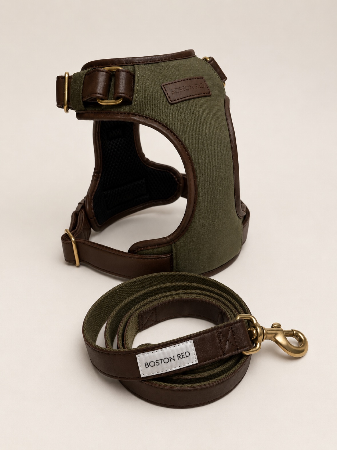 The Founders Set — Boston Red harness and coiled matching leash together in olive canvas and brown leather with brass hardware