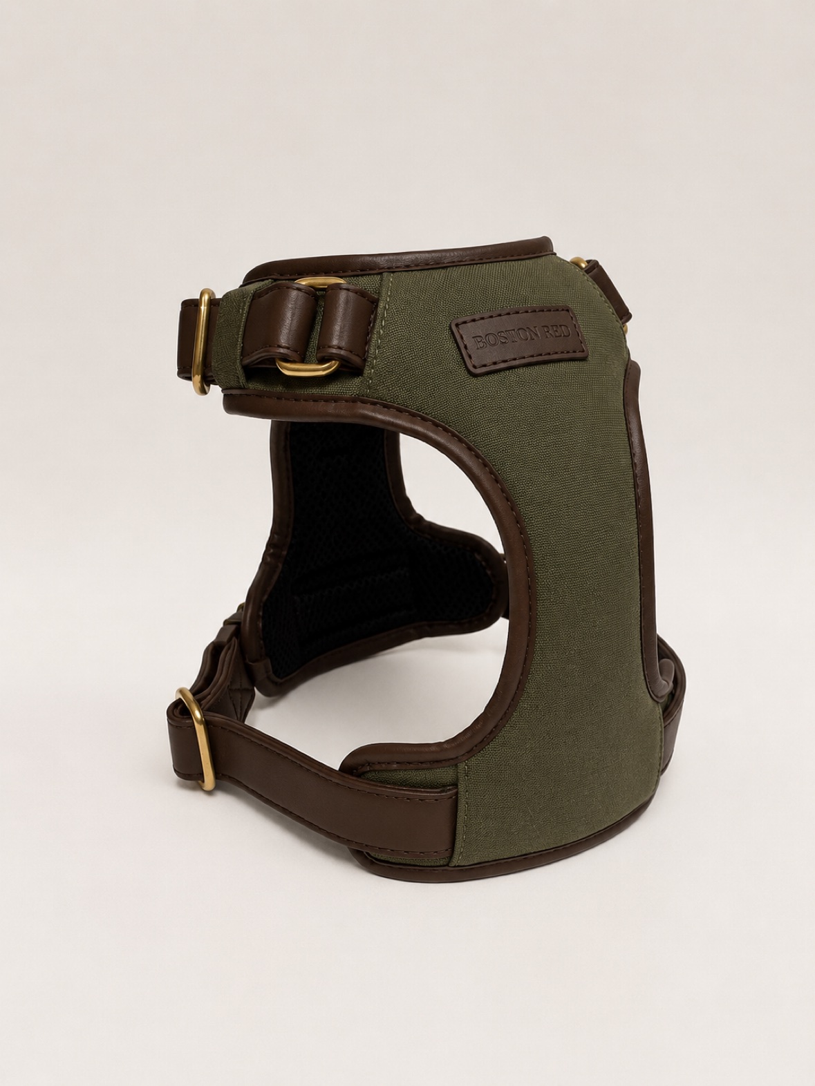 Boston Red Founders Harness on its own — olive canvas, brown leather trim, brass hardware and embossed Boston Red patch